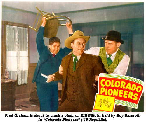 Fred Graham is about to crash a chair on Bill Elliott, held by Roy Barcroft, in "Colorado Pioneers" ('45 Republic).