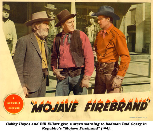 Gabby Hayes and Bill Elliott give a stern warning to badman Bud Geary in Republic's "Mojave Firebrand" ('44).