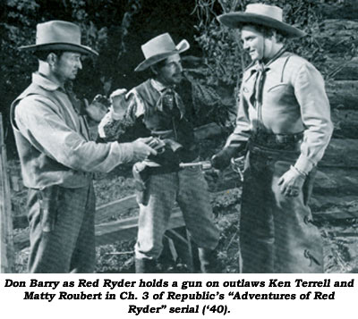 Don Barry as Red Ryder holds a gun on outlaws Ken Terrell and Matty Roubert in Ch. 3 of Republic's "Adventures of Red Ryder" serial (/40).