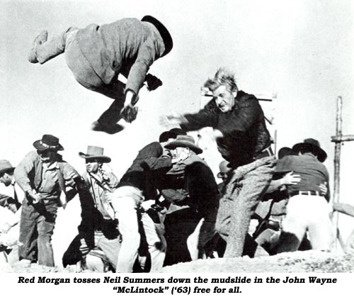 Red Morgan tosses Neil Summers down the mudslide in the John Wayne "McLintock" ('63) free for all.