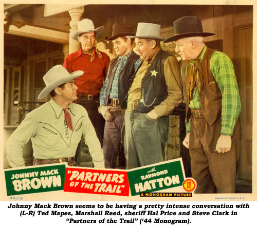 Johnny Mack Brown seems to be having a pretty intense conversation with (L-R) Ted Mapes, Marshall Reed, sheriff Hal Price and Steve Clark in "Partners of the Trail" ('44 Monogram).