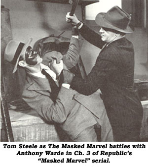 Tom Steele as The Masked Marvel battles with Anthony Warde in Ch. 3 of Republic's "Masked Marvel" serial.