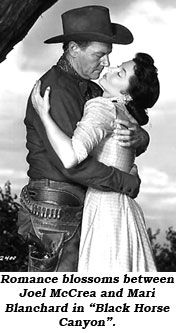 Romance blossoms between Joel McCrea and Mari Blanchard in "Black Horse Canyon".