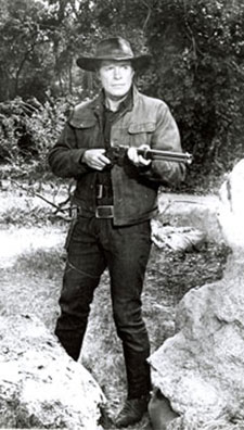 Robert Horton with rifle.