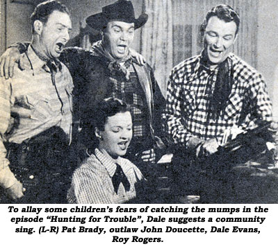 To allay some children's fears of catching the mumps in the episode "Hunting for Trouble", Dale suggests a community sing. (L-R) Pat Brady, outlaw John Doucette and Roy Rogers sing, standing around piano as Dale sings and plays.