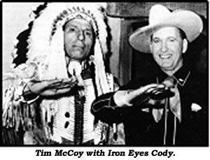 Iron Eyes Cody and Tim McCoy perform Indian sign language.