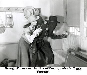 George Turner as the Son of Zorro protects Peggy Stewart.