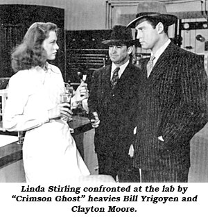 Linda Stirling confronted at the lab by "Crimson Ghost" heavies Bill Yrigoyen and Clayton Moore.