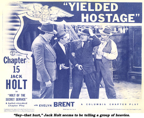 "Say--that hurt," Jack Holt seems to be telling a group of heavies.