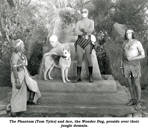 The Phantom (Tom Tyler) and Ace, the Wonder Dog, preside over their jungle domain.