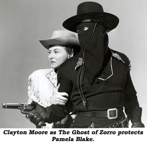 Clayton Moore as The Ghost of Zorro protects Pamela Blake.