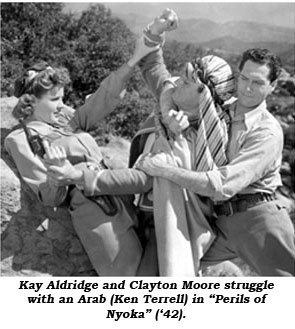 Kay Aldridge and Clayton Moore struggle with an Arab in "Perils of Nyoka" ('42).