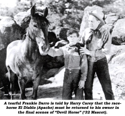 A tearful Frankie Darro is told by Harry Carey that the racehorse El Diablo (Apache) must be returned to his owner in the final scenes of "Devil Horse" ('32 Mascot).