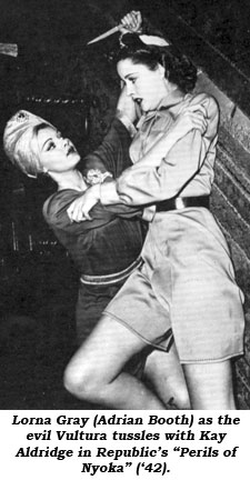 Lorna Gray (Adrian Booth) as the evil Vultura tussles with Kay Aldridge in Republic's "Perils of Nyoka" ('42).
