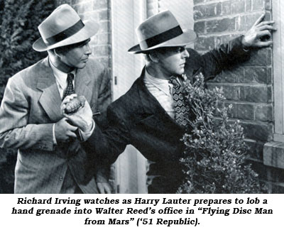 Richard Irving watches as Harry Lauter prepares to lob a hand grenade into Walter Reed's office in "Flying Disc Man from Mars" ('51 Republic).