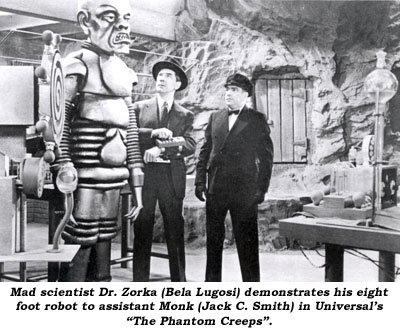 Mad scientist Dr. Zorka (Bela Lugosi) demonstrates his eight foot robot to assistant Monk (Jack C. Smith) in Universal's "The Phantom Creeps".