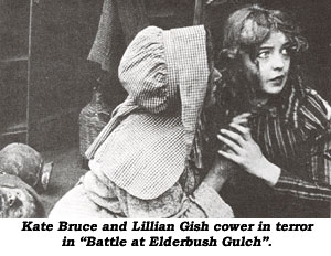 Kate Bruce and Lillian Gish cower in terror in "Battle at Elderbush Gulch".