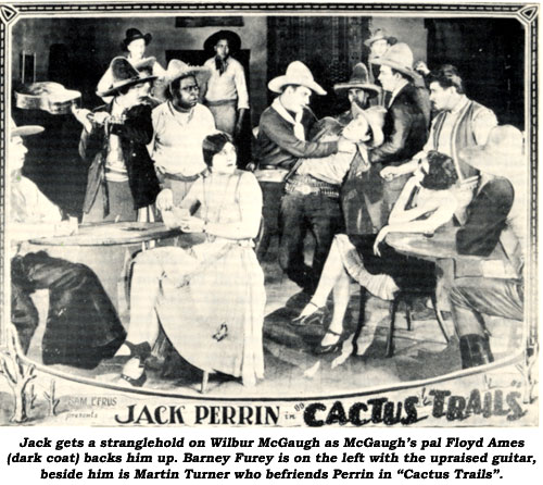 Jack gets a stranglehold on Wilbur McGaugh as McGaugh's pal Floyd Ames (dark coat) backs him up. Barney Fure is on the left with the upraised guitar, beside him is Martin Turner who befriends Perrin in "Cactus Trails".