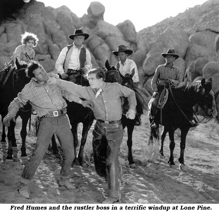Fred Humes and the rustler boss in a terrific windup at Lone Pine.