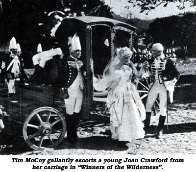 Tim McCoy gallantly escorts a young Joan Crawford from her carriage in "Winners of the Wilderness".