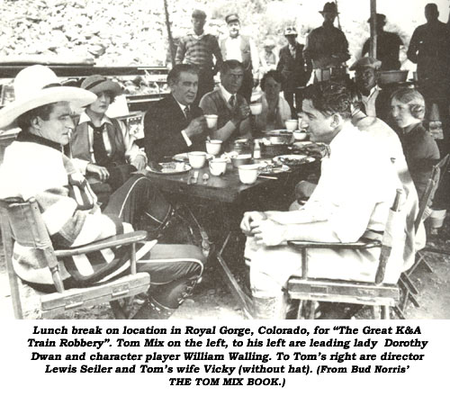 Lunch break on location in Royal Gorge, Colorado, for "The Great K&A Train Robbery". Tom Mix on the left, to his left are leading lady Dorothy Dwan and character player William Walling. To Tom's right are director Lewis Seiler and Tom's wife Vicky (without hat). (From Bud Norris' THE TOM MIX BOOK.)