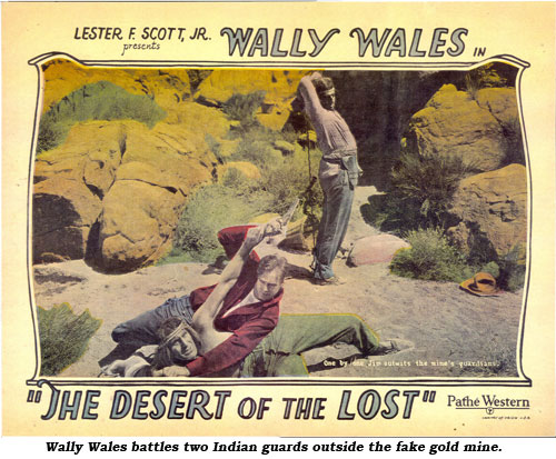 Wally Wales battles two Indian guards outside the fake gold mine.