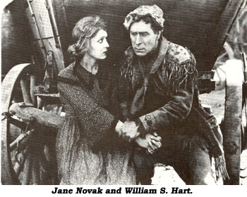 Jane Novak and William S. Hart in "Wagon Tracks".