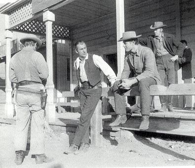 Kelo Henderson and Stewart Granger take a break from filming Gun Glory