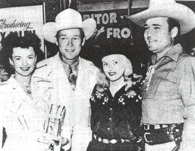 Dale Evans and Roy Rogers, along with Monogram co-stars Reno Browne and Whip Wilson, get together for a '50s Hollywood event.