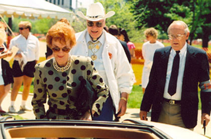 Joanne and Monte Hale beside an Indy 500 official.