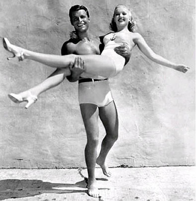Buster Crabbe must surely have enjoyed this publicity shot with Betty Grable. 
