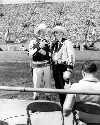 Gene with Sheriff Eugene Biscailuz at the L.A. Coliseum for the annual Sheriff’s Championship Rodeo in 1954.