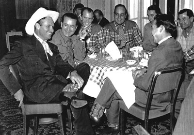 A great gathering of musical talent...Gene with (L-R) Frankie Marvin, Fred Martin and Bert Dotson of the Cass County Boys, Johnny Bond, Ray Whitley and 
Carl Cotner. 