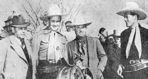 A crowd estimated between 15 to 25,000 persons jammed the streets of Albuquerque, NM on March 13, 1939 to celebrate the Will Rogers Highway 66 Convention. After the route was originally well on its way to completion, founders decided Hwy 66 should be designated as a living memorial to Will Rogers as it begins in Santa Monica, passes through L.A. where Will last lived and also passes through the old Cherokee Nation, Claremore and Rogers County, OK, scene of Rogers’ early life. Attending the ceremonies (above) were (L-R)New Mexico Governor John E. Miles, actor Monte Blue, Albuquerque Mayor Clyde Oden and Columbia B-Western star Charles Starrett.