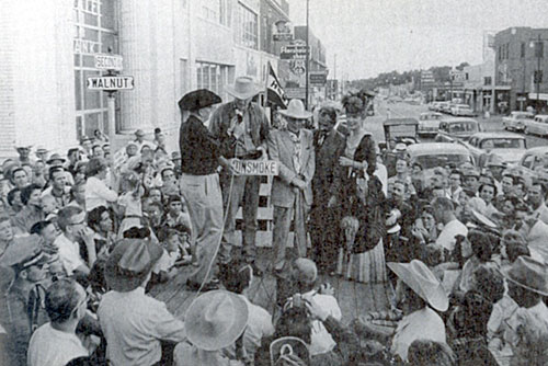 James Arness, Milburn Stone and Amanda Blake help rename Walnut Street to Gunsmoke in Dodge City, Kansas, 1958. 