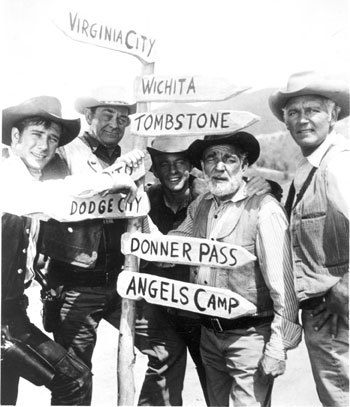 Which way do we go? The “Wagon Train” cast (L-R) Robert Fuller, John McIntire, Michael Burns, Frank McGrath, Terry Wilson. (The hidden sign behind Bob’s arm seems to be Modesto.) 