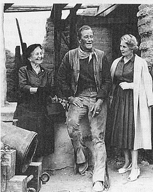 While filming “The Alamo” John Wayne met with ladies from the Daughters of the Republic of Texas. At the time, the 120 year old group had run The Alamo since 1905. 
