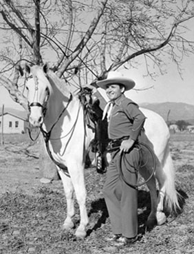 Two great photos of Whip Wilson with his horse Rocket.