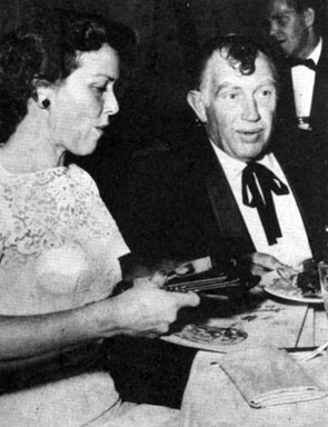 Andy Devine and wife Dodie “jingle” at the premiere party for “Arond the World in 80 Days”. 