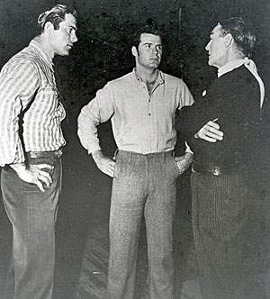 Clint Walker joined James Garner and Randolph Scott for a chat while the latter two were filming “Shootout at Medicine Bend” (‘57 WB). (Thanx to Neil Summers.) 