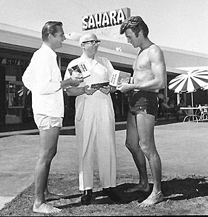 “Rawhide”’s Eric Fleming and Clint Eastwood are greeted for a tennis tournament at the Sahara casino in Las Vegas, NV. (Thanx to Terry Cutts.) 