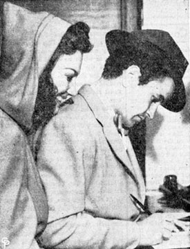 Buck Jones’ daughter Maxine and Noah Beery Jr. apply for a marriage license at the marriage license bureau in L.A. on March 25, 1940.