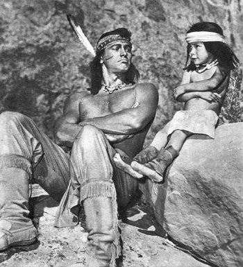 Rock Hudson spent a lot of time between takes while filming “Taza, Son of Cochise” by playing with three year old Jimmy Yellow, youngest of 100 Navajo Indians who worked on the film. Neither could speak the other’s language but they got on splendidly together just the same. 