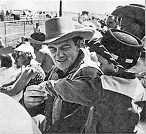 James Arness and a “Gunsmoke” admirer at a 1957 rodeo appearance.