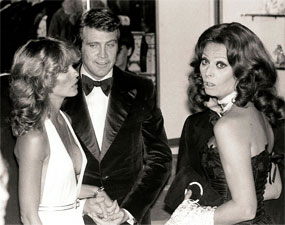 “The Big Valley”—Lee Majors glances at wife/actress Farrah Fawcett...but what is Sophia Loren looking at? 