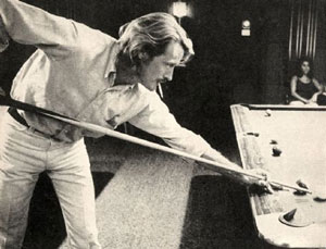 “Lancer”, “Custer”—Wayne Maunder works on his pool game. 