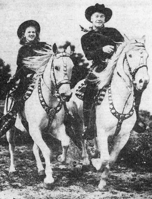 Grace Bradley and husband Bill “Hopalong Cassidy” Boyd take their splendid 
Arabian steeds out for a ride. 