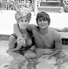 Michael Landon in the pool with Monique Mattson. Who? 