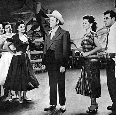 Rehearsing for Gene Autry’s appearance on a “Godfrey and Friends” telecast in 1953 are (L-R) Frank Parker, one of the McGuire sisters, Marion Marlowe, Gene Autry, Janette Davis and Julius LaRosa. 