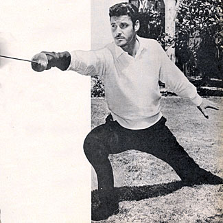 Guy Williams practices his swordsmanship for his role as “Zorro”. 